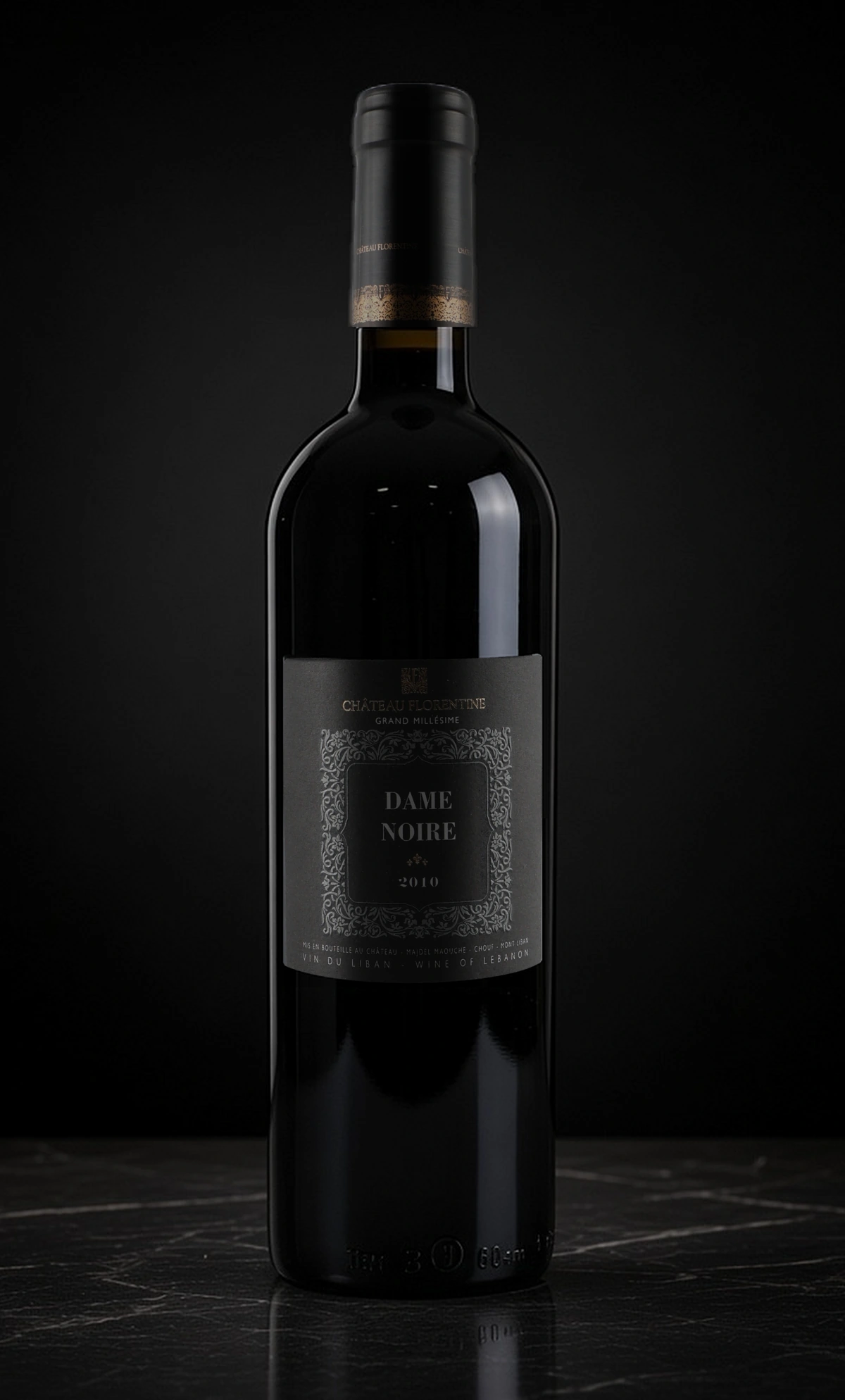 Dame Noire 2010 on a dark stone surface