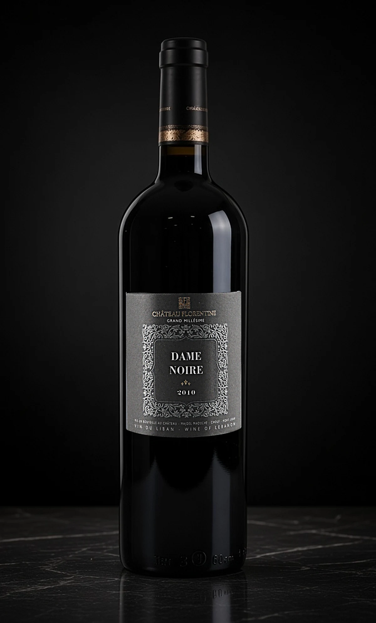 Dame Noire 2010 on a dark stone surface